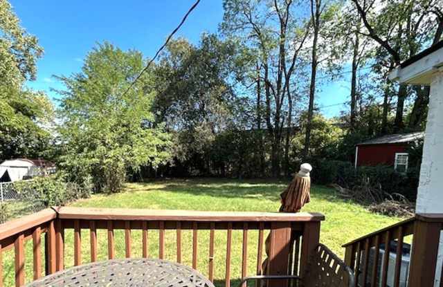 Brick 3 bedroom, 2 bath ranch style home, Updated kitchen, Open floor plan, Deck