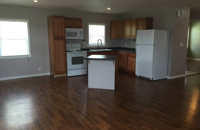 Charming 2-Bedroom Home with Porch  Storage Space