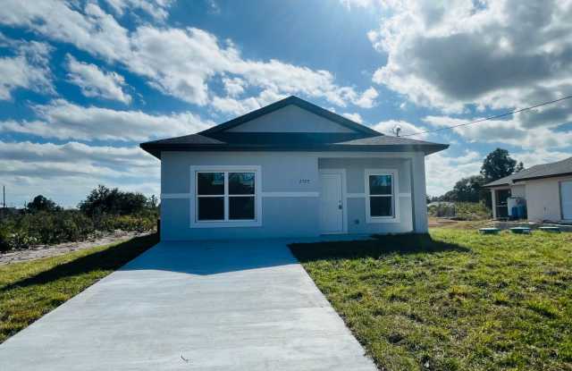 Brand-New 2BR/2BA Home with Lanai on Oversized Lot – Desirable SW Lehigh Acres