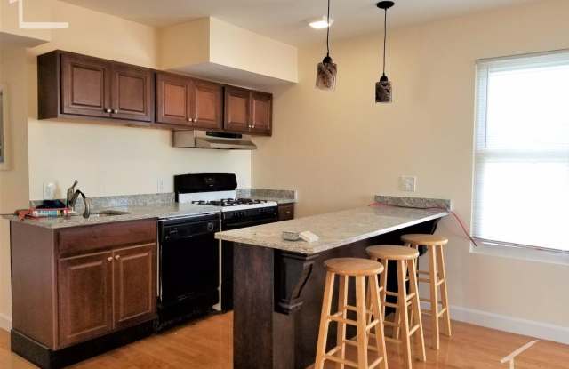 Great price and location for a modern unit in Allston (2 bathrooms!)