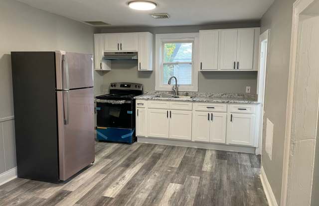 Reduced Price! Newly renovated 4 bedroom 2 level apartment.