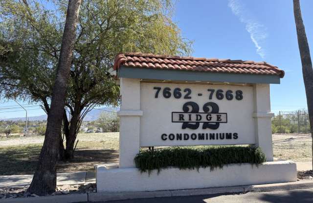 East side condo with community pool/spa/assigned covered parking place