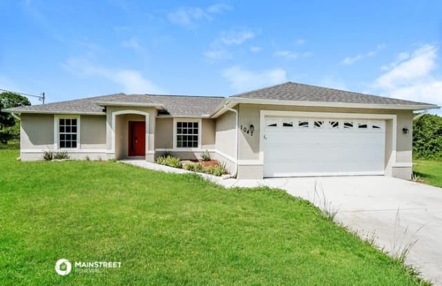 1047 Kellogg Street East - 1047 Kellogg Street, Lehigh Acres, FL 33974