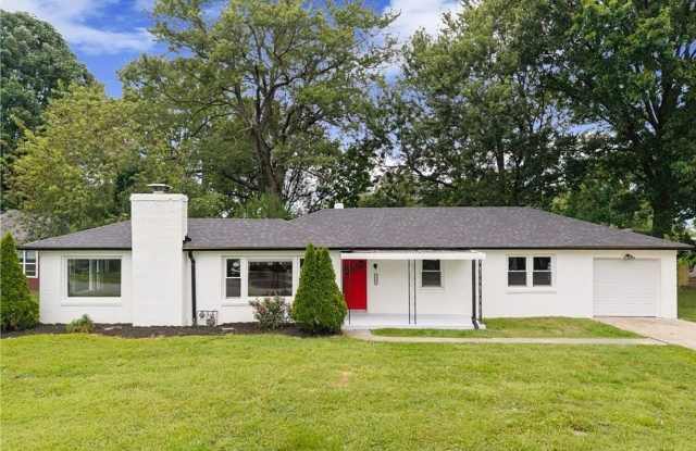 Photo of Modern 4 Bedroom Home with Granite Kitchen  Tiled Baths