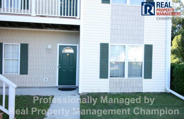 Ground Level Condo with Community Pool