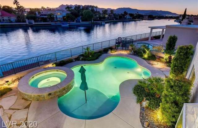 Photo of Vegas's Only Available Waterfront Rental ~ 4 Bedroom Desert Shores Lake Front Home