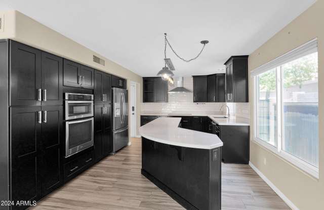 6457 E SNOWDON Street