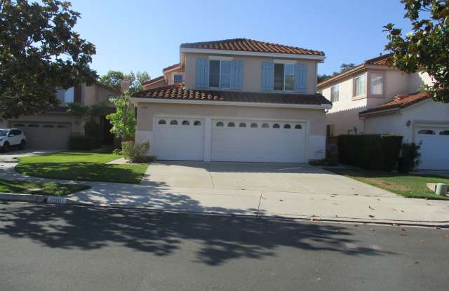Desirable & spacious Sabre Springs 5 bedroom 3 bath 2 story home!