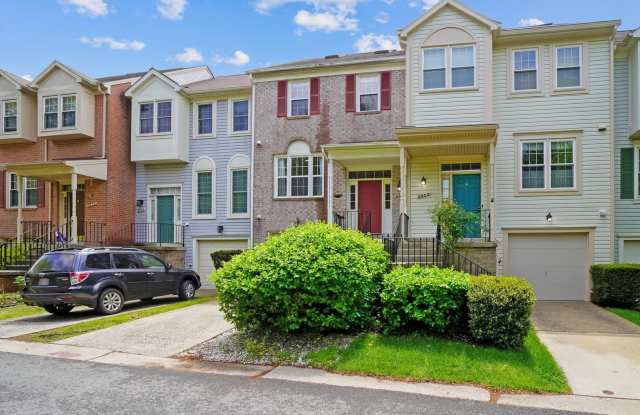 Updated 4 level TH w/ 2 FB & 2 "1/2" baths + One car garage!