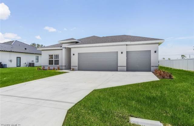 413 NW Juanita Court - 413 Northwest Juanita Court, Cape Coral, FL 33991