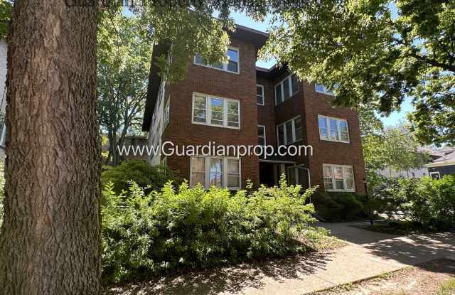 Uptown Basement Level, Heat Paid, Parking Available, Vaulted Ceilings, One Month Free