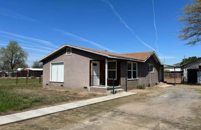 Photo of 2 bedroom, 1 bath home with lots of room inside and out.