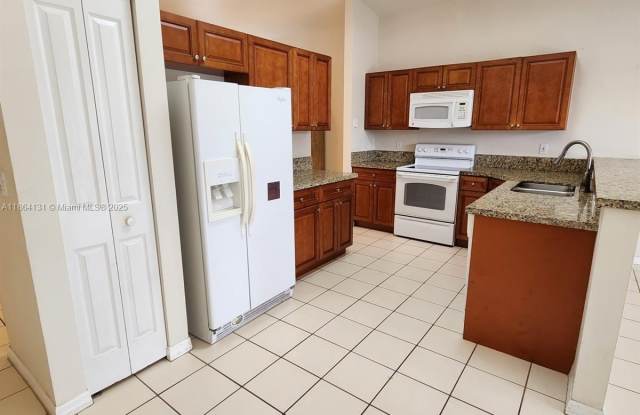 3406 SW Coco Palm Dr