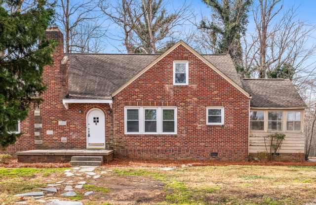 Photo of SW, Large Brick Two Bedroom PLUS Two Sun-Rooms, Hardwoods, LR  Separate DR, Fire Place!