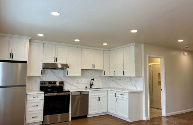 Light, bright & all NEW inside. Beautiful upgrades in this naturally bright 2 bd, 1 ba unit with a huge garage.