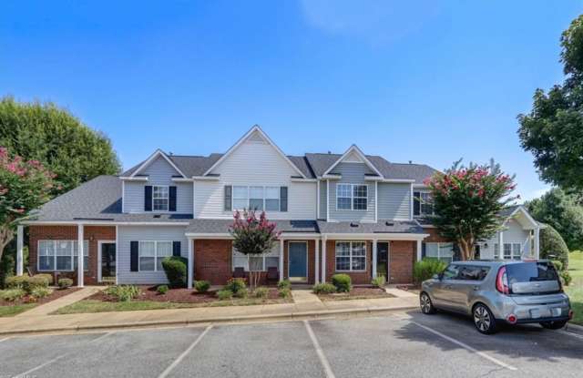 Amazing updated 2 bedroom 2.5 bathroom townhouse in NW Greensboro Keswick Place. Lawn care included.