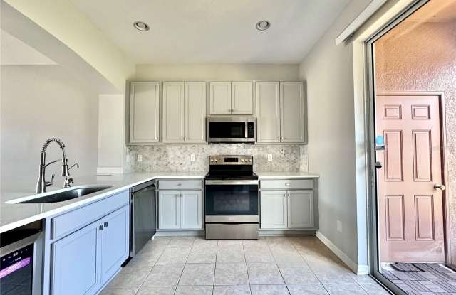 6950 TOWERING SPRUCE DRIVE