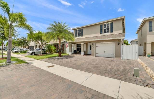 537 NE 6th Ct
