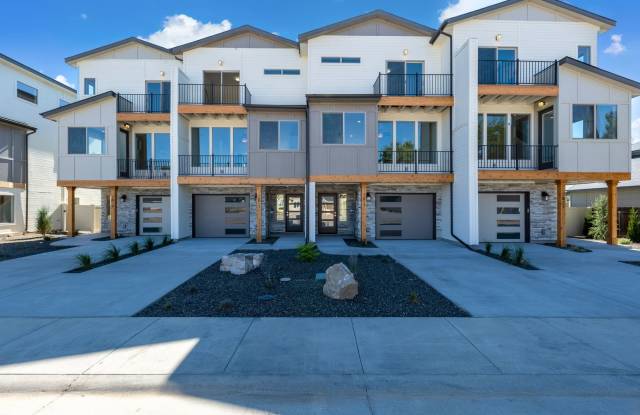 SOLAR POWERED TRI-LEVEL TOWNHOME BLENDS MODERN FUNCTION AND STYLE