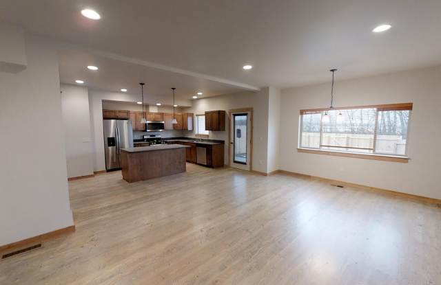 Spacious Townhome with Central Heat/Air - Two Car Garage, Fenced in Backyard! **EARLY BIRD PRICING - See details below**