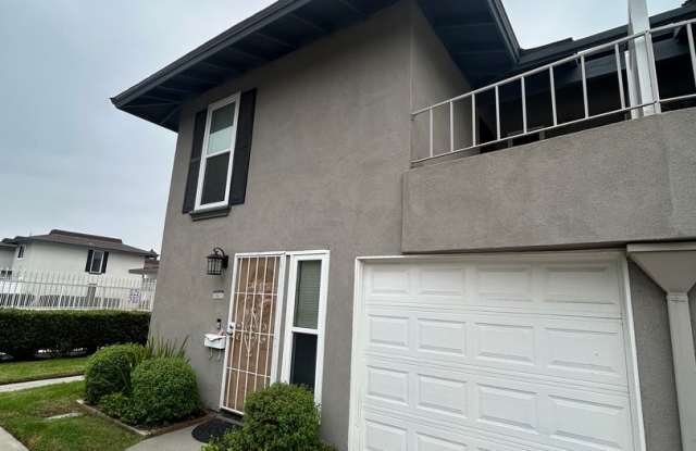 Two story Cypress townhouse, garage, patio, laundry and pool access