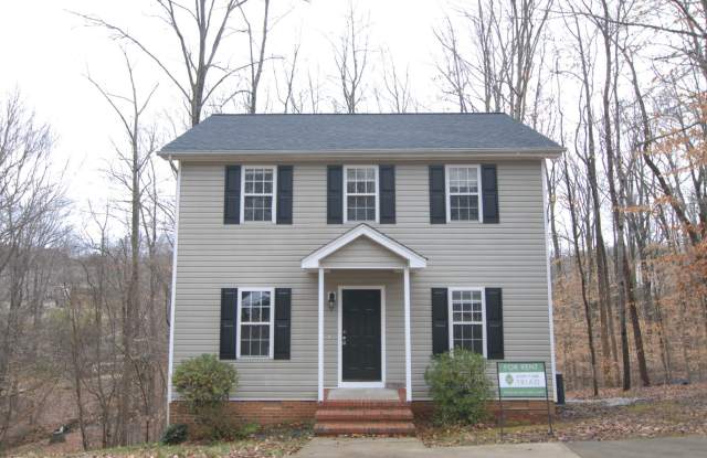 Fabulous 3 bedroom 2.5 bath home in a desirable NW Greensboro neighborhood with large deck overlooking a creek wooded area photos photos