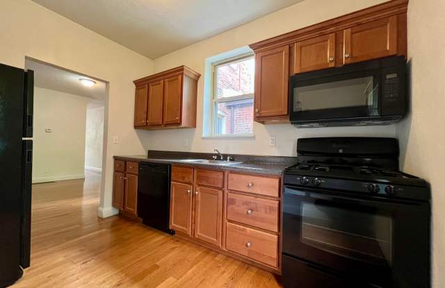 Lovely Two Bedroom Townhome with Hardwood Floors throughout! Washer & Dryer Provided!