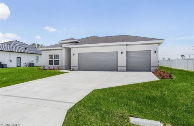 242 NW 15th Place - 242 Northwest 15th Place, Cape Coral, FL 33993