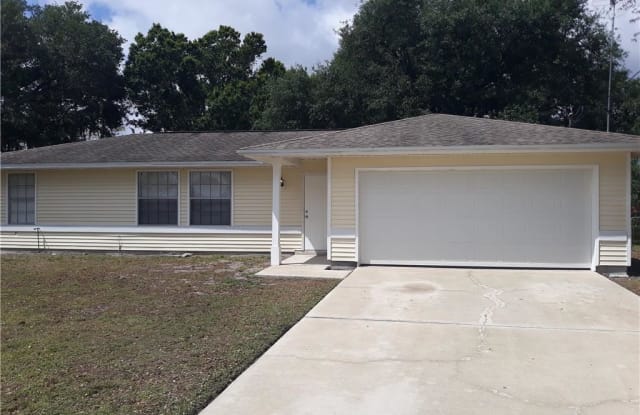 427 Candlewick CIR W - 427 Candlewick Circle West, Lehigh Acres, FL 33936