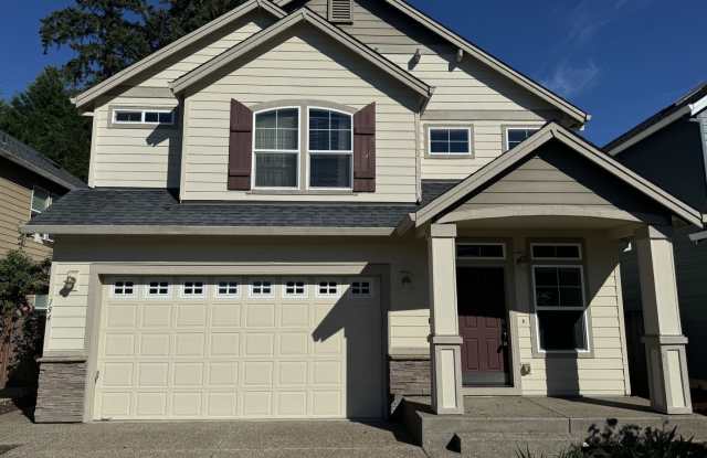 154 NE Porto Way ~ 1/2 Off First Month's Rent in this Stunning Orenco Home!