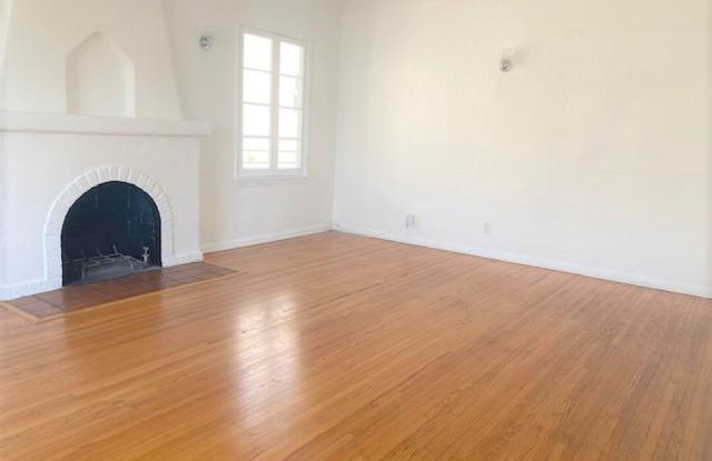 Beautiful Spanish Style Upper Unit in Duplex. Only One Block From Beverly Hills!