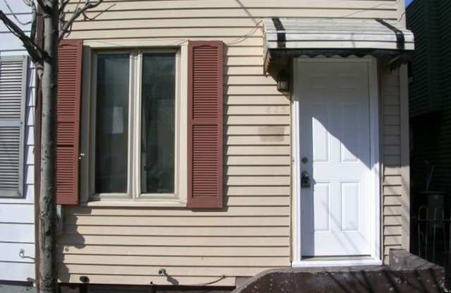 Photo of Fantastic 2+ Bedroom w/ 1 1/2 Bath Home! Recently Renovated! Hardwood Floors! Central Air! W/D Hook-ups!!