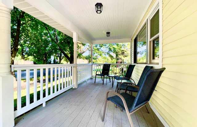 Photo of *Available August 2025* Welcome to "The Yellow Porch" – A Charming Home in the Heart of Traverse City