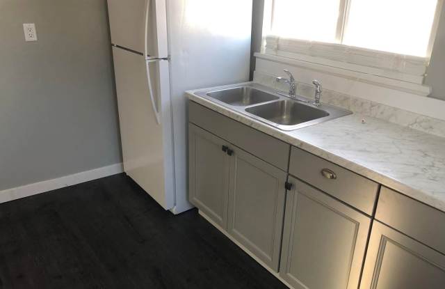 Charming 1 bed, 1 bath home featuring a fenced yard