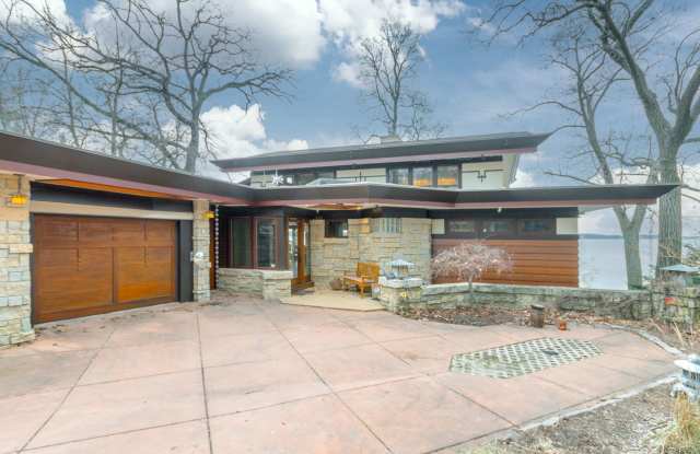Lake Mendota Dream Home in Desirable Spring Harbor. Stunning Views, Direct Lake Access, and Frank Lloyd Wright-Inspired Design. Fully Furnished.