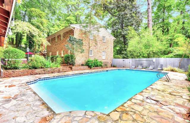 Photo of Luxurious 5-Bedroom Retreat with Pool, Hot Tub, and Spacious Backyard – Just Minutes from Atlanta’s Attractions!