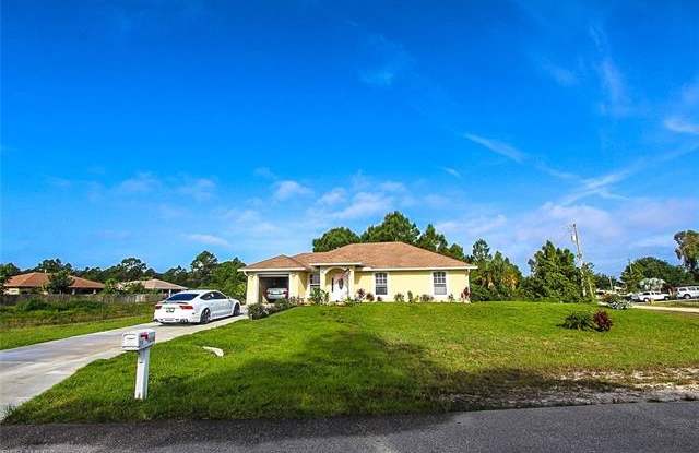 136 Parish DR - 136 Parish Drive, Lehigh Acres, FL 33974