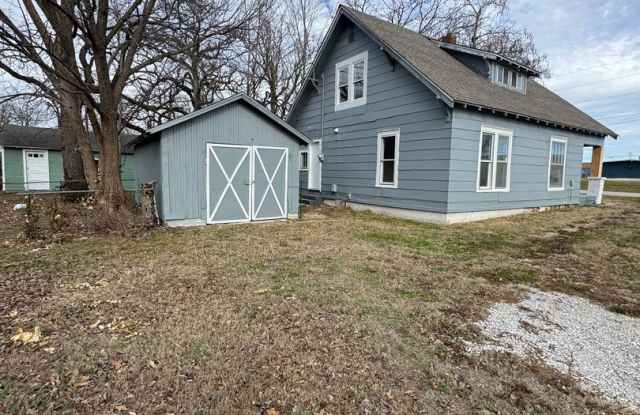 4 bedroom/1 bath house w/storage building