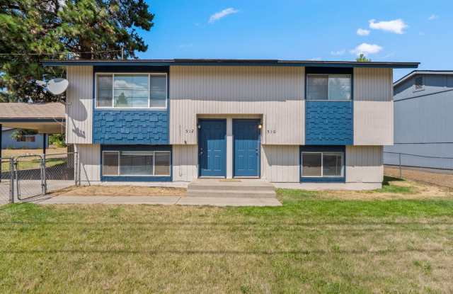 2 bedroom 1 bath house with a fenced front yard close to EWU!