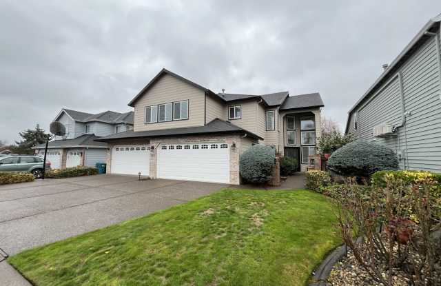 Grand 5 Bedroom Home Featuring 19ft Ceilings, Family Room  Main-Level Suite