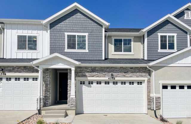 Photo of Beautiful 2-Story Premier Townhome w/Attached 2-Car Garage and Unfinished Basement in Herriman