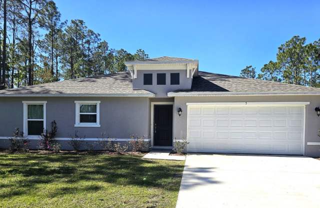 $1,000 OFF 1ST MONTHS RENT***STUNNING 3/2 HOME IN PALM COAST - 3 Kashmir Trail, Palm Coast, FL 32164