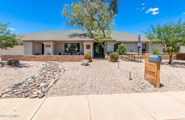 1928 E WOODMAN Drive
