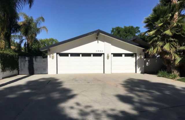 Exquisite Stockdale Estates Sanctuary: Spacious 4-Bedroom Home with Luxurious Pool and Garden