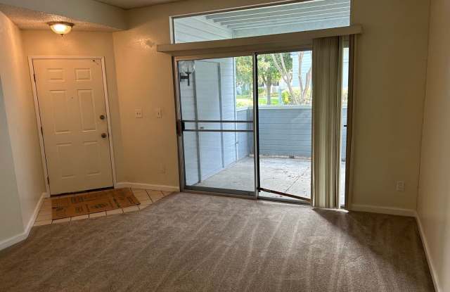 Spacious bright condo with new carpet and new paint and 2 bathrooms