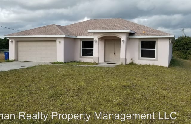 231 Pennfield Street - 231 Pennfield Ave, Lehigh Acres, FL 33974