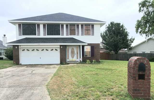 This two story, 4 Bedroom/3 Bath home with high ceilings and natural lighting in Marcus Lake Subdivision!
