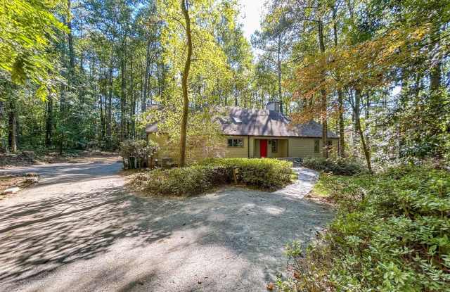 Spacious Contemporary Home in a Private Wooded Setting