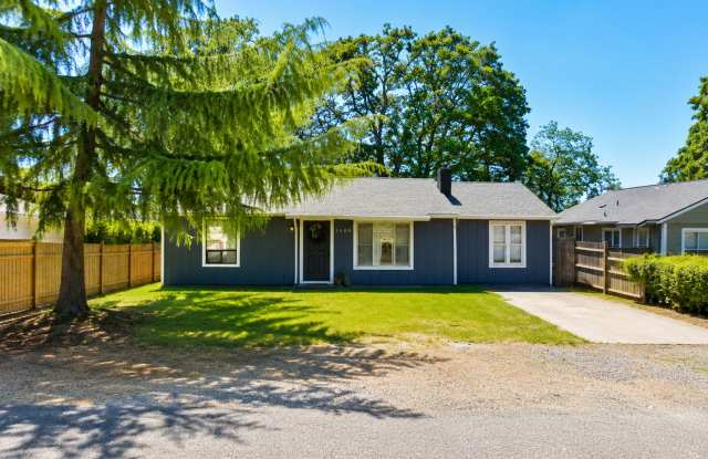 Renovated 3-Bedroom Home with Fenced Yard, Fireplace & In-Unit Laundry