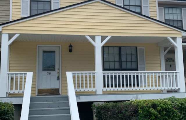 This charming 3-bed, 2.5-bath townhome is available for rent. - 912 Pineland Avenue, Hinesville, GA 31313